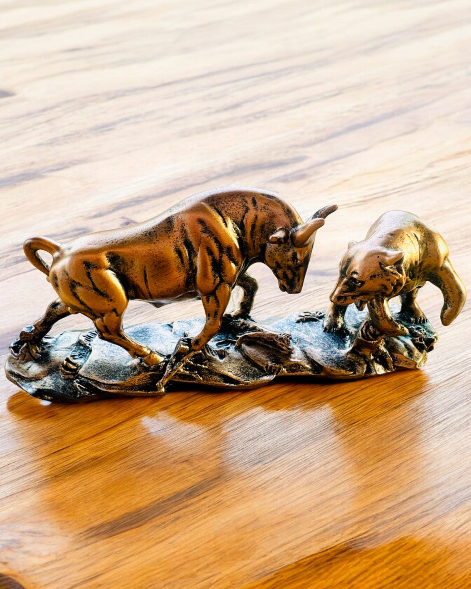 "The Clash of the Bull and the Bear" - Copper-red sculpture with engraving option