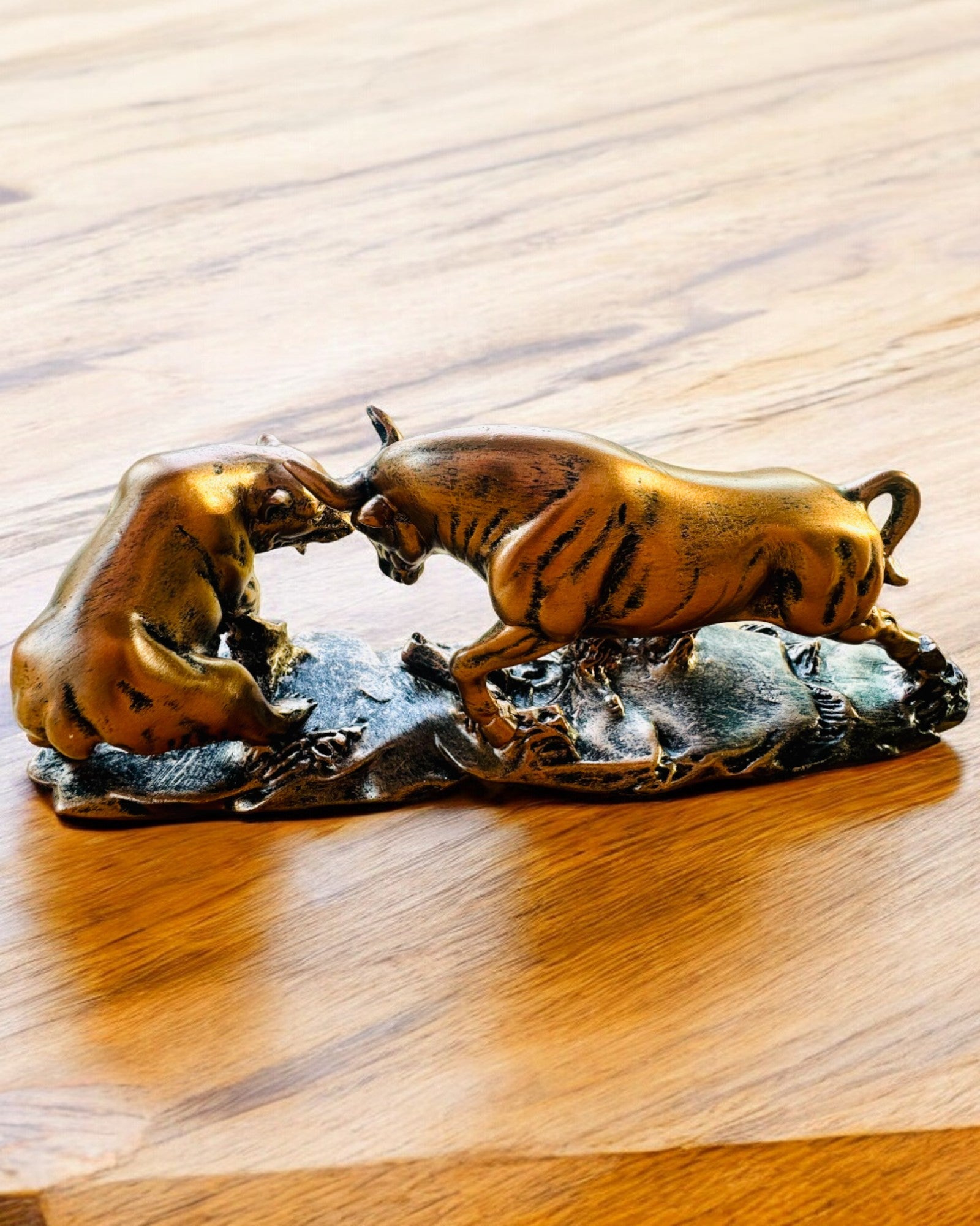 "The Clash of the Bull and the Bear" - Copper-red sculpture with engraving option