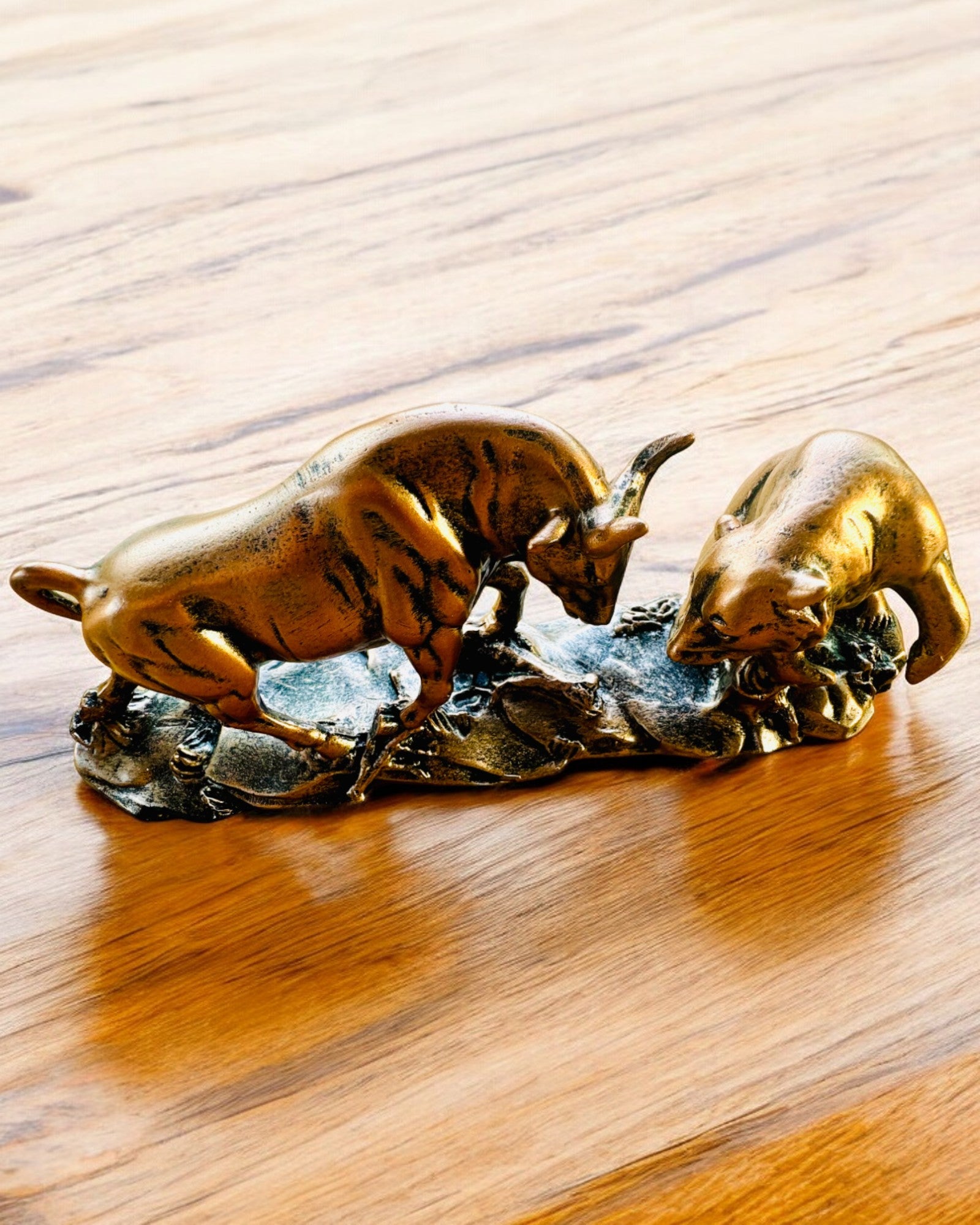 "The Clash of the Bull and the Bear" - Copper-red sculpture with engraving option